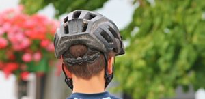 Man wearing bicycle helmet