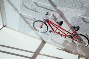 Tandem electric bike: A tandem bike on a wall